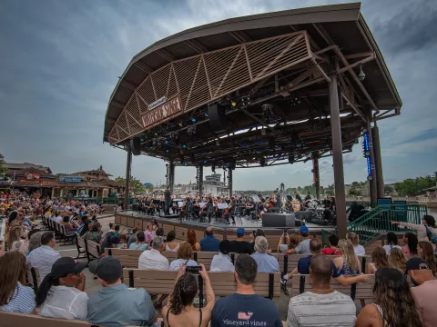 AdventHealth Orchestra on the AdventHealth Waterside Stage at Disney Springs.