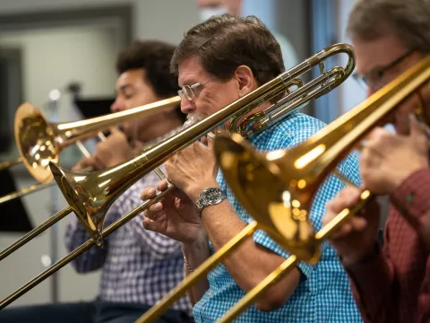 The AdventHealth employee orchestra rehearses.