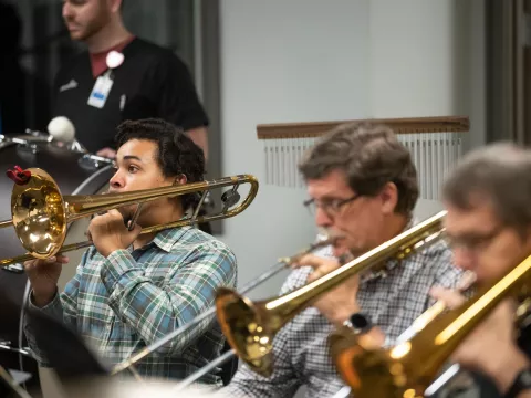 The AdventHealth employee orchestra rehearses.