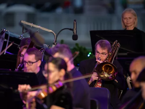 The AdventHealth employee orchestra performs at Disney Springs.