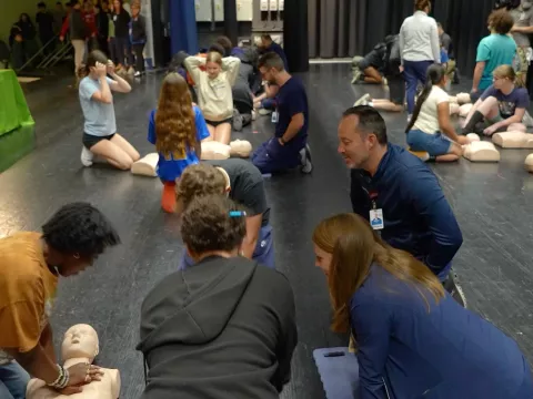 AdventHealth clinical team members teach hands-only CPR to Lyman High School students