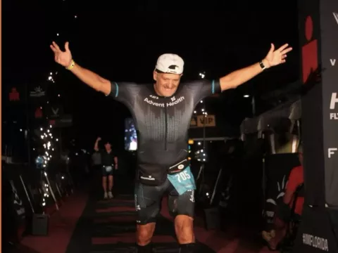 Darin Santangelo reaches the Ironman finish line.