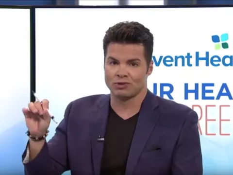 George Estevez, news anchor, speaking into camera