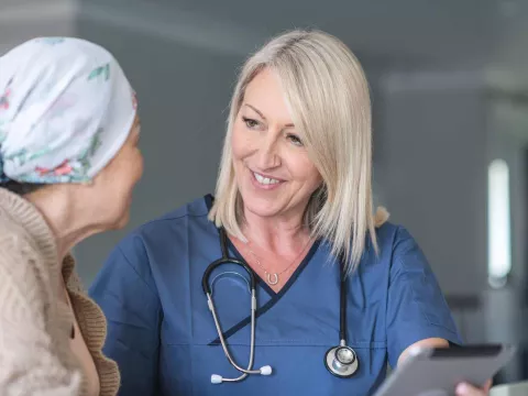 Physician with elderly patient