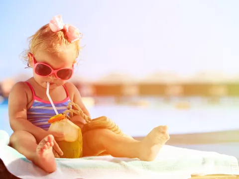 child relaxing in sun during the summer