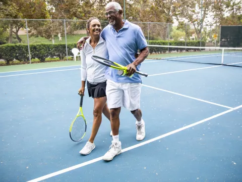 Active Older Adults Playing Tennis