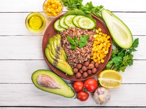 A plate filled with delcious and healthy foods.