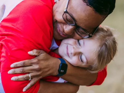 Mrs. Carlene Honor hugs Kennedy Vogt at the Greater Orlando Heart Walk.