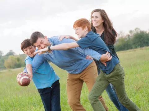 CEO Mike Murrill and his family playing football