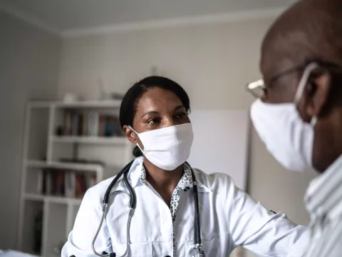 A man visiting his doctor.
