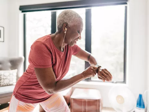 A woman exercising at home.