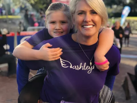 mother and daughter finishing AdventHealth Lady Track Shack 5k