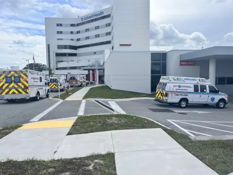 AdventHealth North Pinellas hospital with ambulances 
