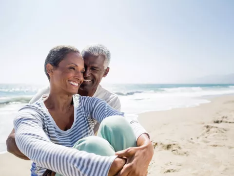 A man and a woman on the beach together