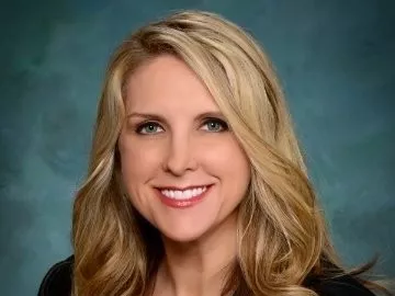 Kristi Baker's professional headshot.