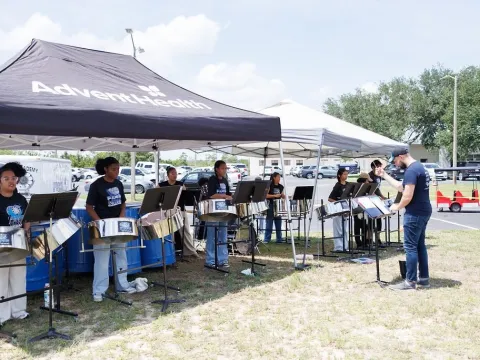 More than 200 people spent the afternoon at the community celebration at AdventHealth Lake Placid, having fun and learning about the health care options available to them in their community. The event featured a live musical performance from Walker Memorial Academy Steel Drum band. (photo courtesy: Frank Branca/Infinity Reflections)