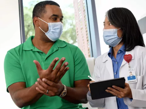 A man visiting his doctor.