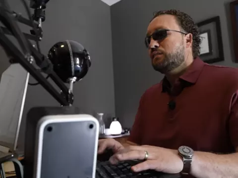 Marcus Engel uses his computer