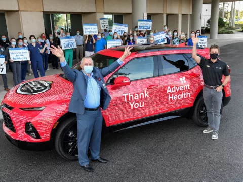 AdventHealth Daytona Beach CEO Ed Noseworthy welcomes NASCAR driver Jamie McMurray