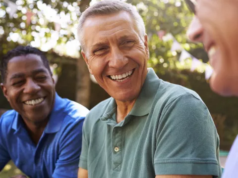 Men talking about health screenings.