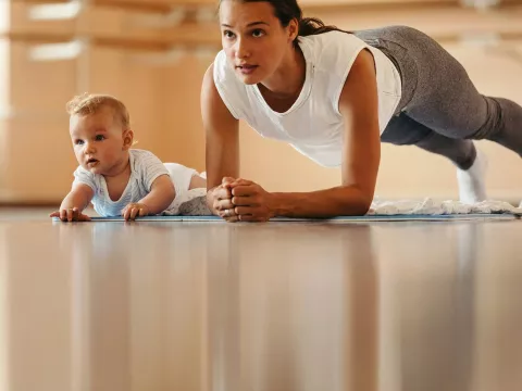 A mom doing a home workout.