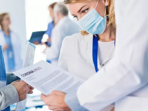 female physician in face mask