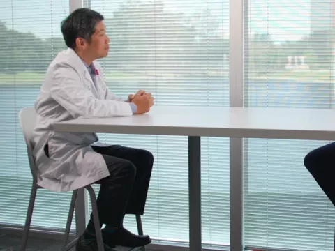 Dr. Hsu and Garrett Caldwell talking