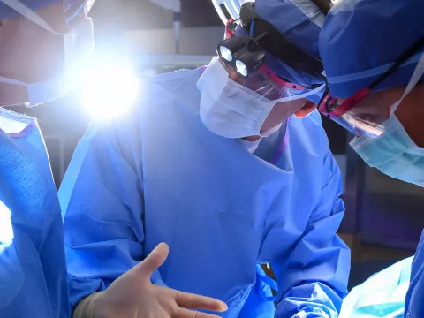 Surgeons discussing an operation