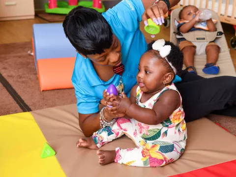 Teacher and student at the West Lakes Early Learning Center
