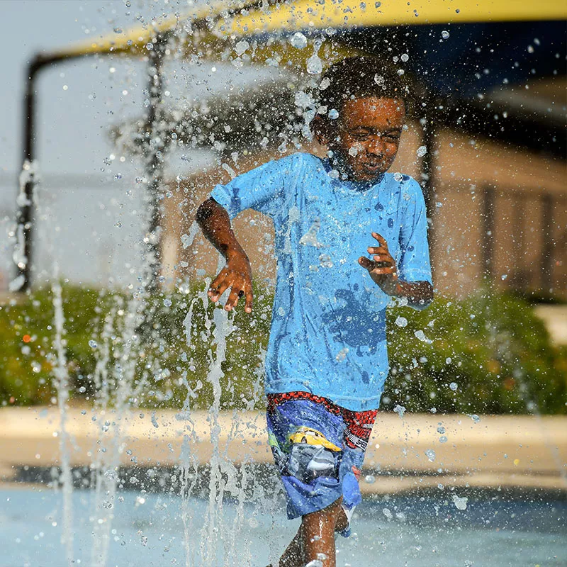 Boy having fun at water park 