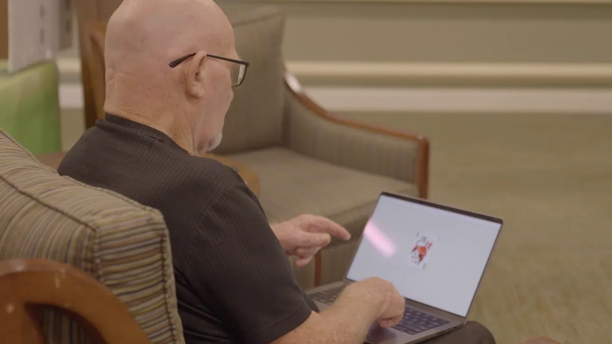 AdventHealth patient taking the online rapid digital cognitive assessment test as part of the innovative Davos Alzheimer's Collaborative study.