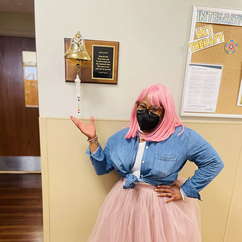 Bernadette Osson breast cancer survivor ringing the bell after chemo