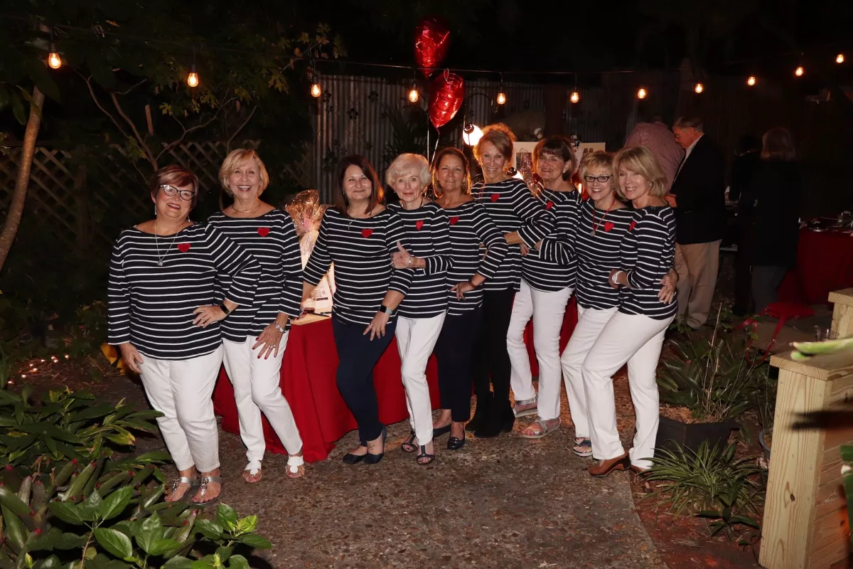 A group of women posing for a photo.