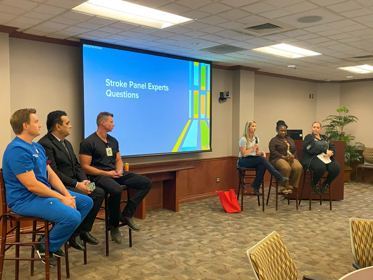 After the simulation, attendees got to ask a panel of experts questions about strokes, stroke care, emergency response and more. (From L-R Dr. Kaleb Culpepper, Dr. Tariq Hamid, Dr. Mark Ortolani, ALS Captain Bethany Smith, 911 dispatchers Qunda English and Hannah Carpenter.)