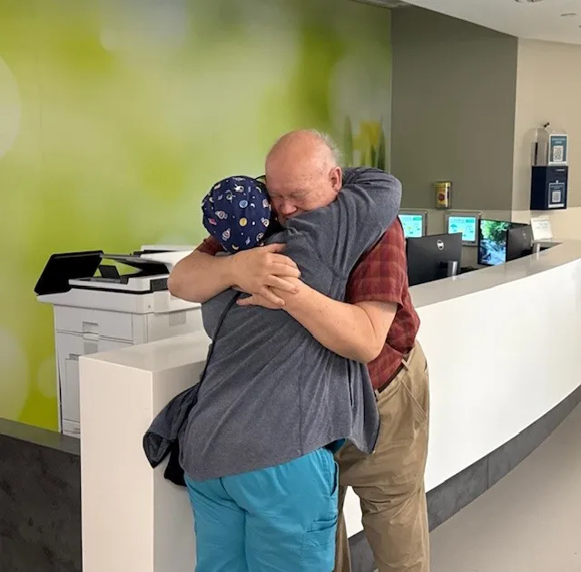 It was a heartwarming moment when the patient embraced one of the nurses.