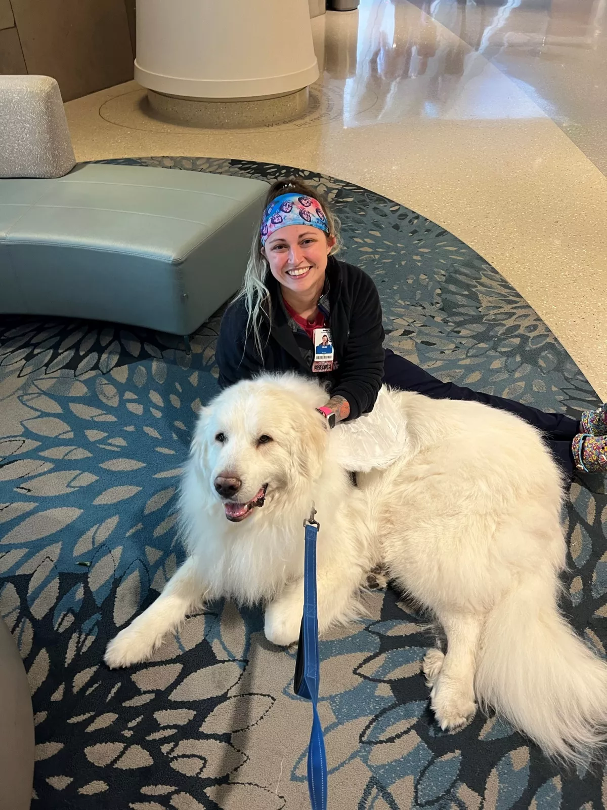 Duke McDreamy comforts an AdventHealth team member. 