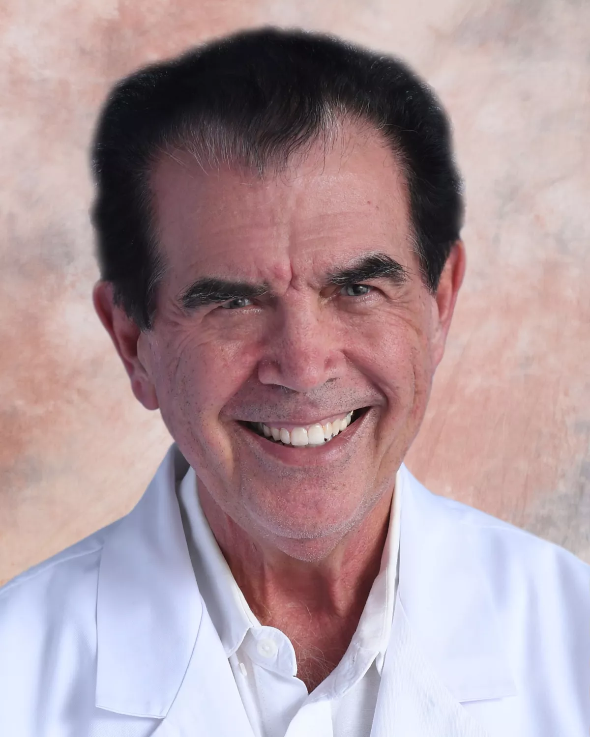 A professional headshot photo of Donald Geldart, MD