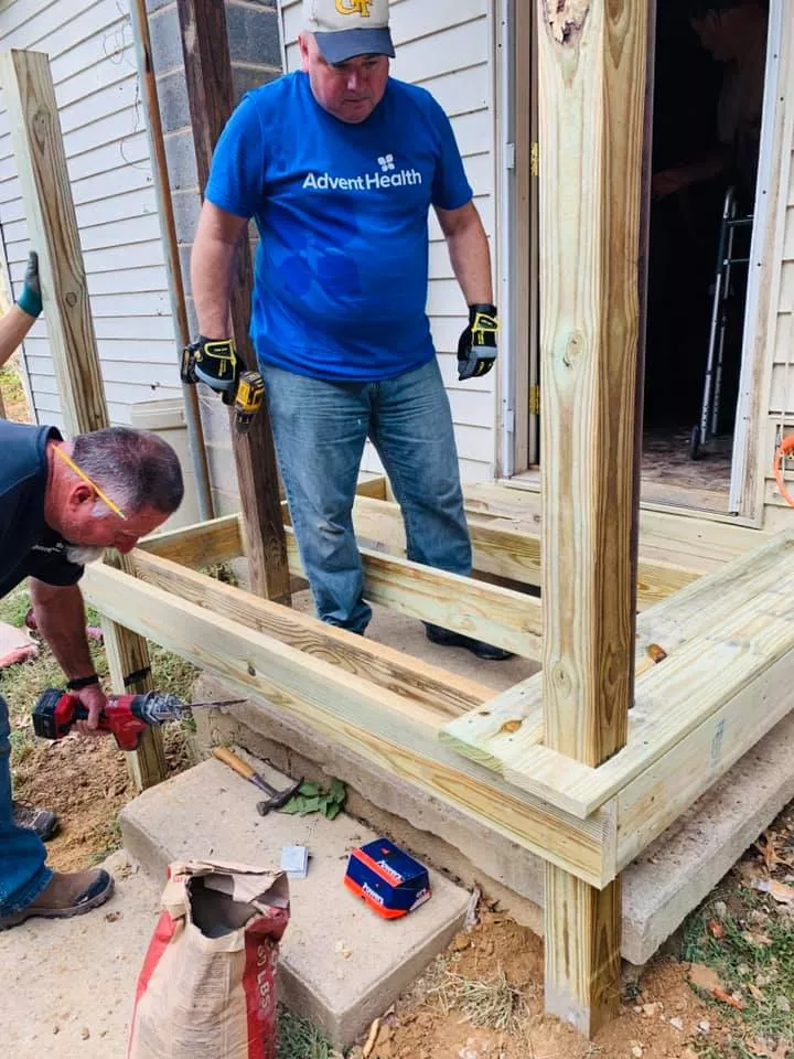 AdventHealth team building a wheelchair ramp.