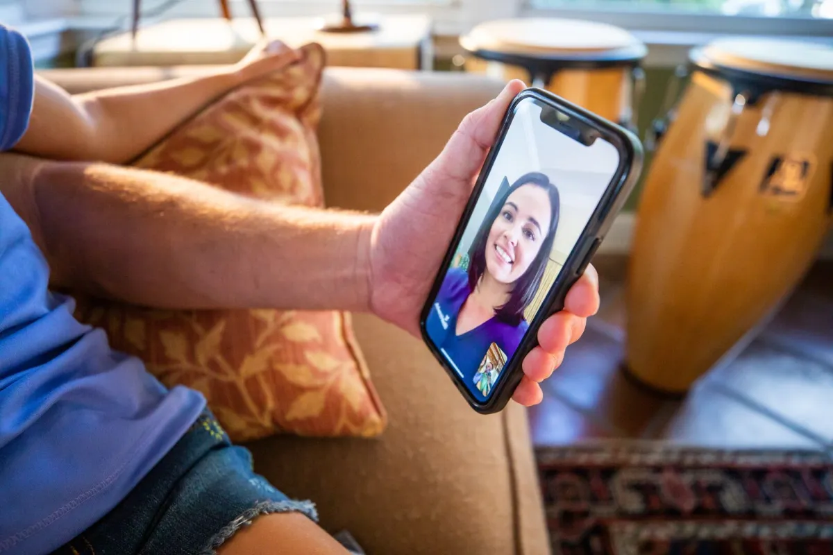 Patient on phone with nurse during virtual visit