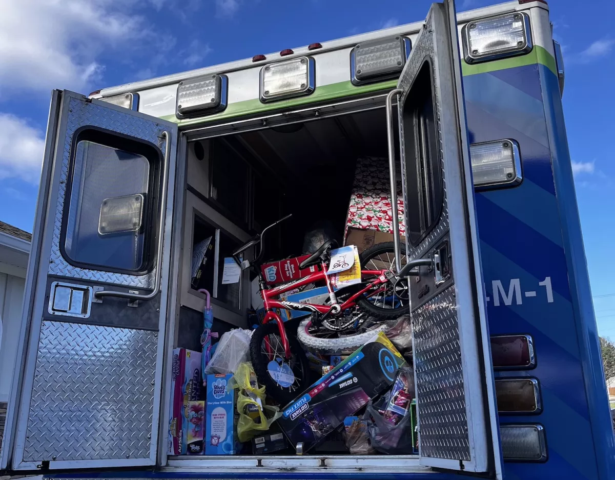 an ambulance is packed with toys ready for children.