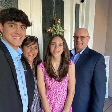 Jimmy Brown with his son, wife, and daughter.
