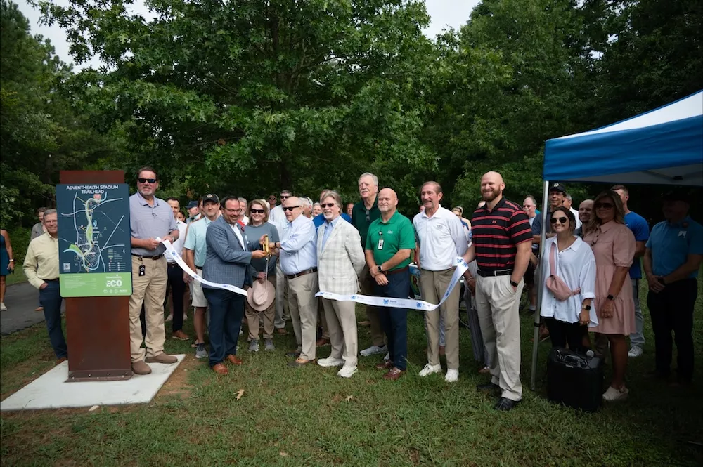 Sendros with fellow AdventHealth leaders during the launch of the AdventHealth ECO Greenway Trail System