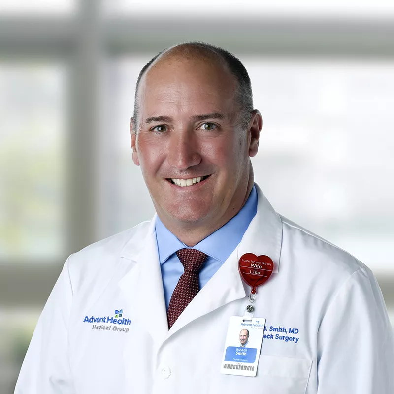 Dr. Russell Smith is an otolaryngology surgeon and the director of thyroid and parathyroid surgery at the AdventHealth Cancer Institut