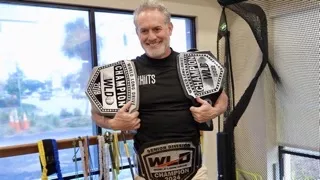 "Fast Eddie" Fernandes shows off his long drive world championship belts