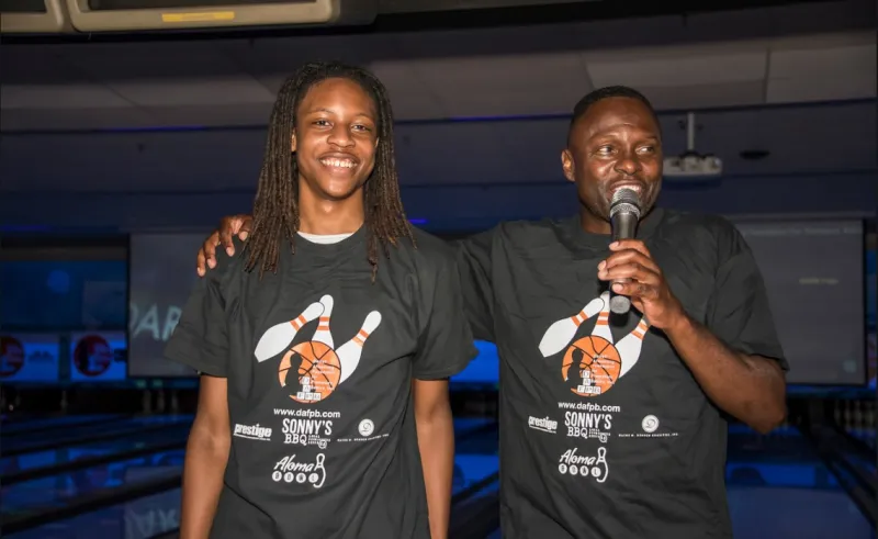 Darrell Armstrong with his son