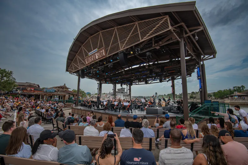 AdventHealth Orchestra on the AdventHealth Waterside Stage at Disney Springs.