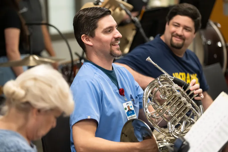 The AdventHealth employee orchestra rehearses.