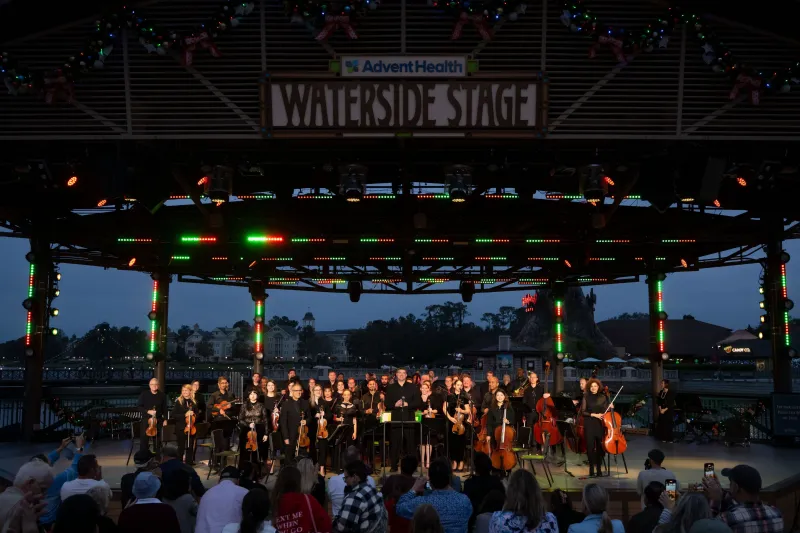 The AdventHealth employee orchestra performs at Disney Springs.