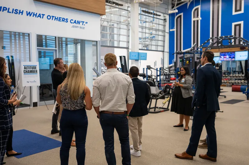 Members of the community learn more about the Orlando Magic Altitude chamber inside the AdventHealth Training Center  
